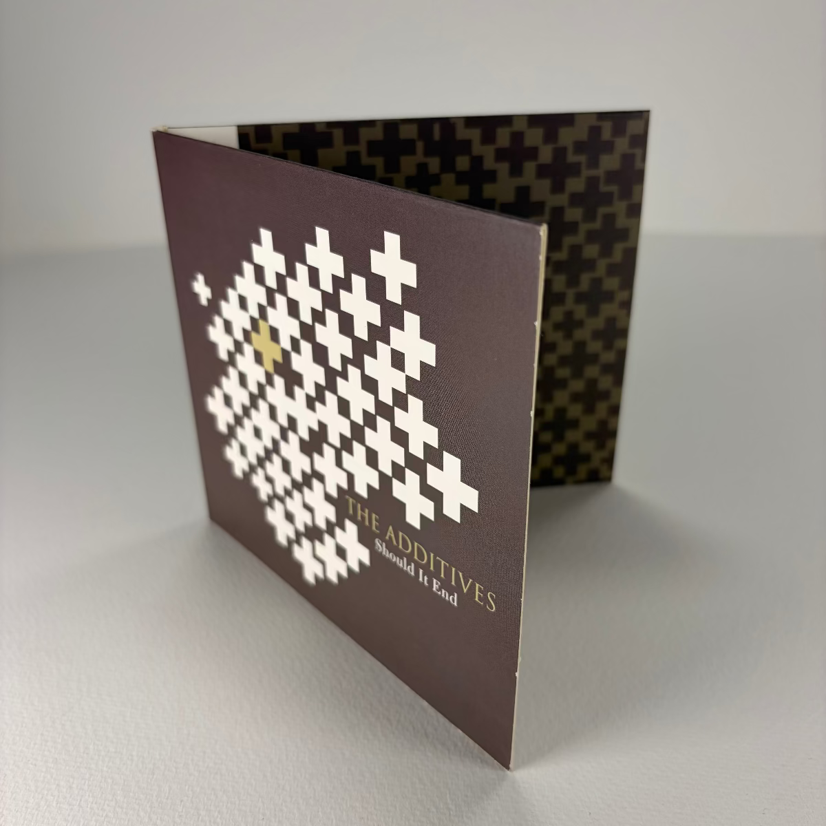 Card with pixelated design and text on a plain background
